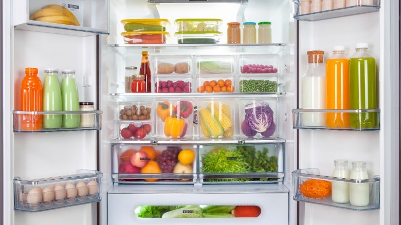 Open refrigerator full of produce