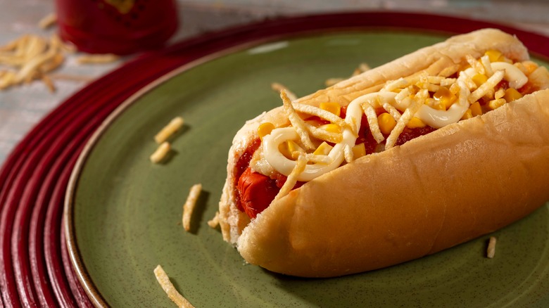 hot dog on green plate