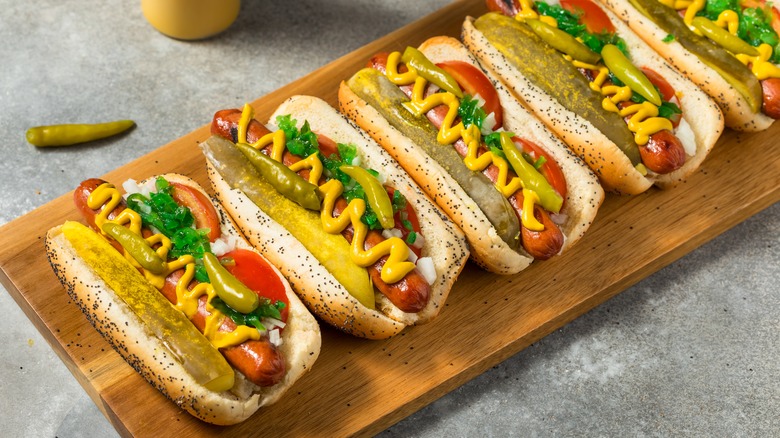 chicago dogs on cutting board