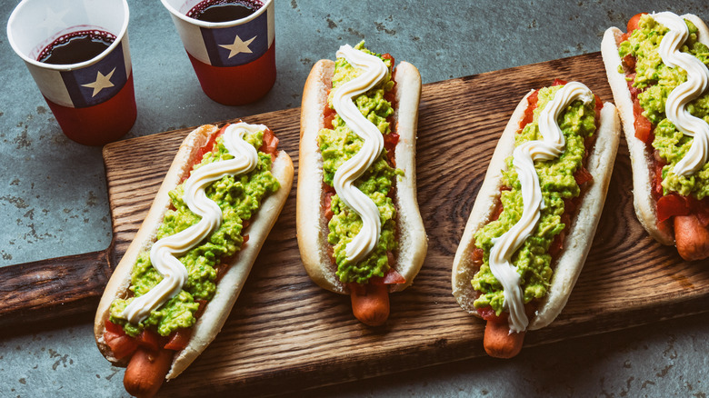 hot dogs on cutting board