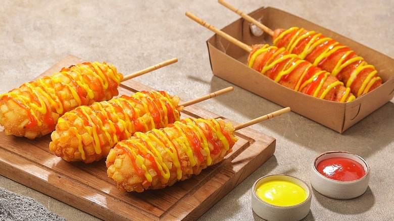 Corn dogs with sauce