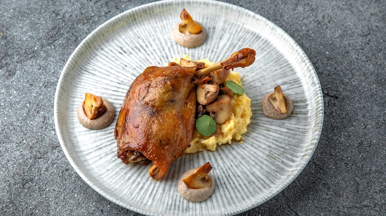 duck confit on plate