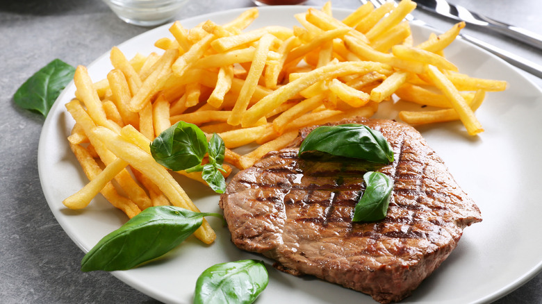 steak frites on plate