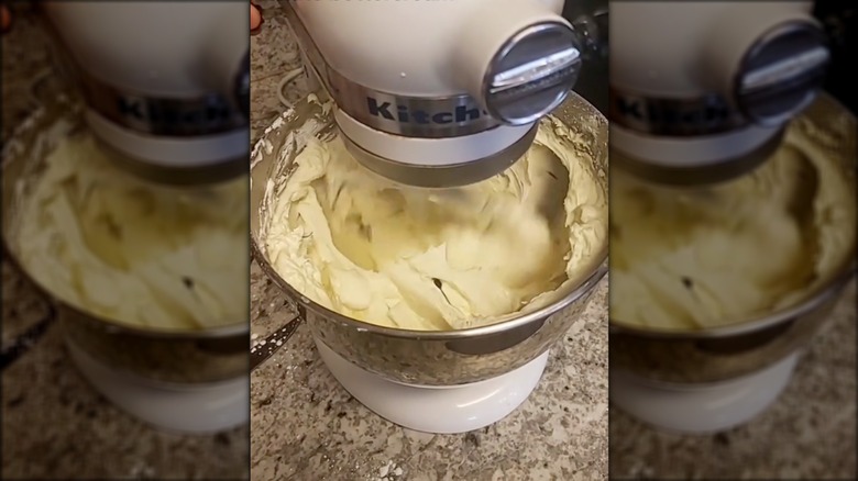 white buttercream in mixing bowl