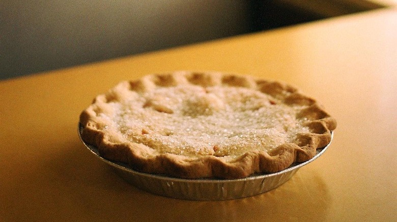 Cherry pie on table