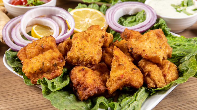 Amrtisari fish pakora on salad