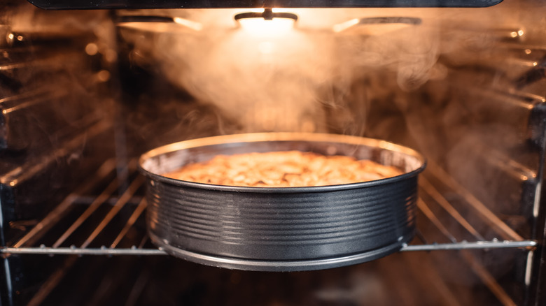 Cake baking in oven