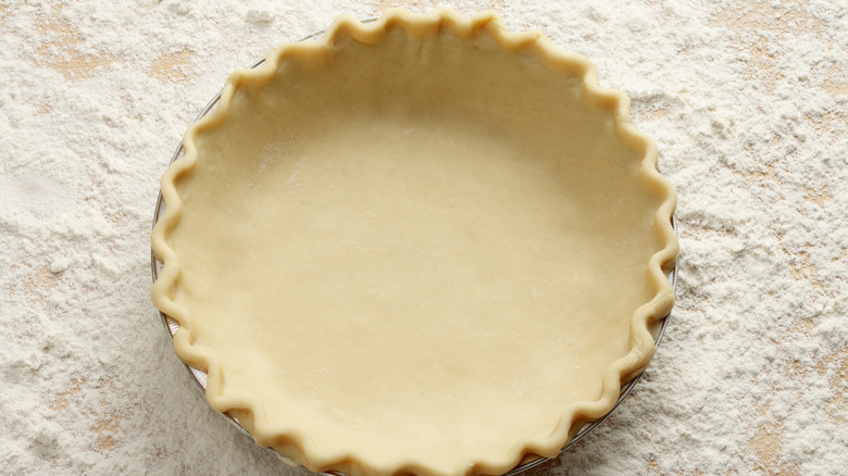 Empty pie crust in tin
