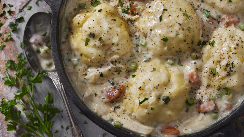 Chicken and dumplings in a pot