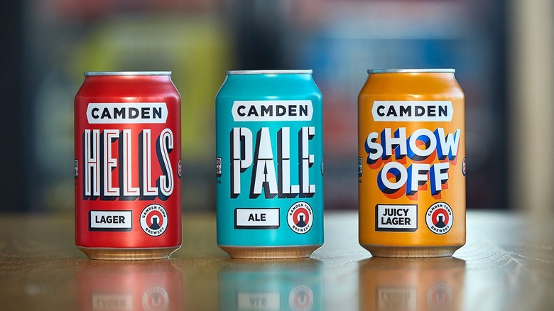 Presentation of three Camden Town beer cans