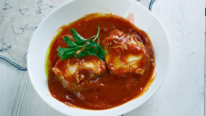 Red soup in white bowl 