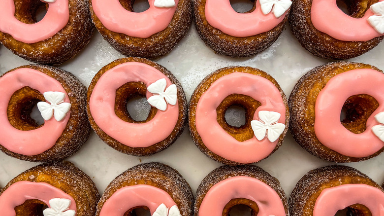 Cronuts with pink frosting