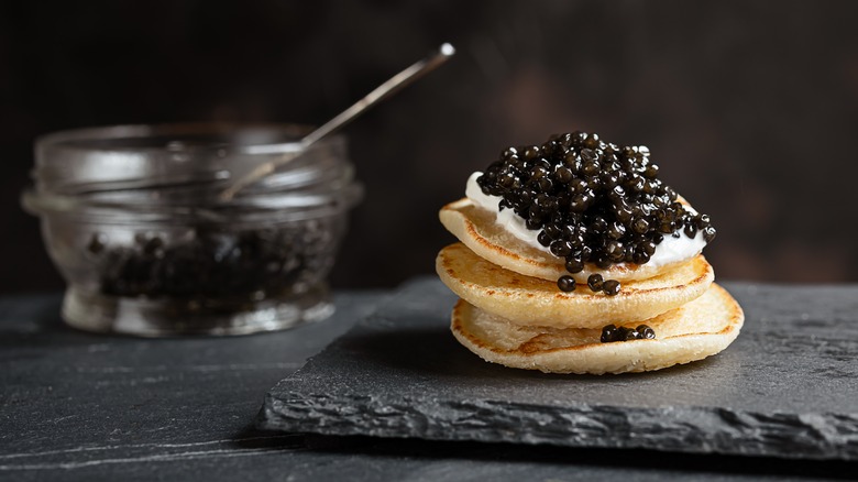 Caviar on blinis