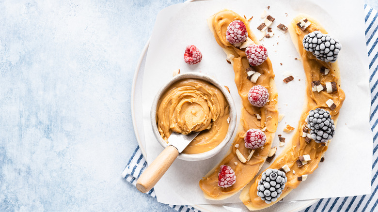 Bananas topped with spread and fruit