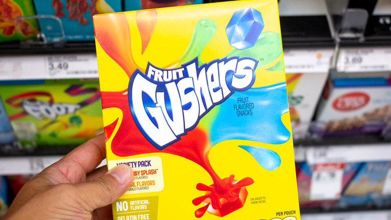 Man holding Fruit Gushers box