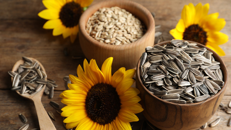 Sunflower seeds in wooden bowl