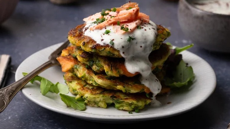 Close-up of zucchini and trout fritters on a plate