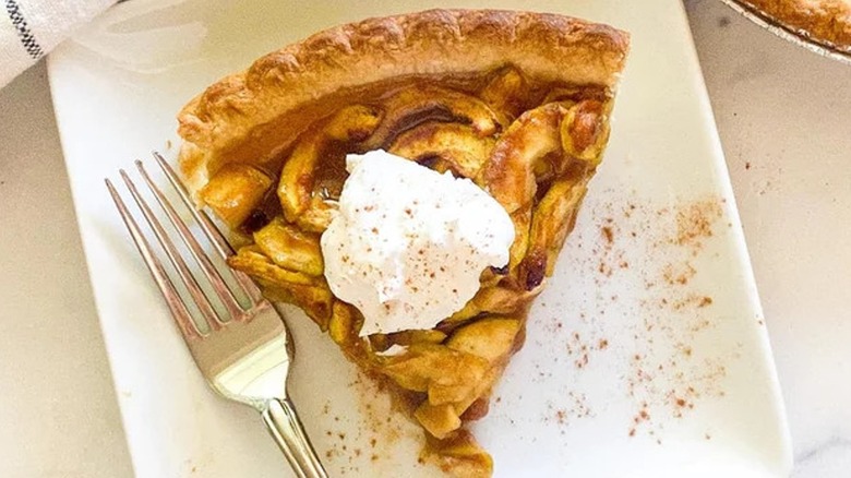 Top-down view of a plated zucchini apple pie slice