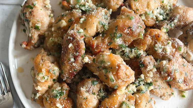 Parmesan chicken wings on plate