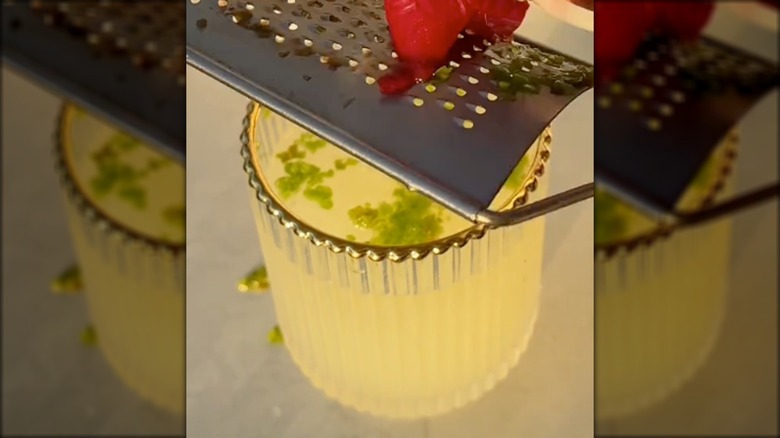 Grating frozen jalapeño into cocktail