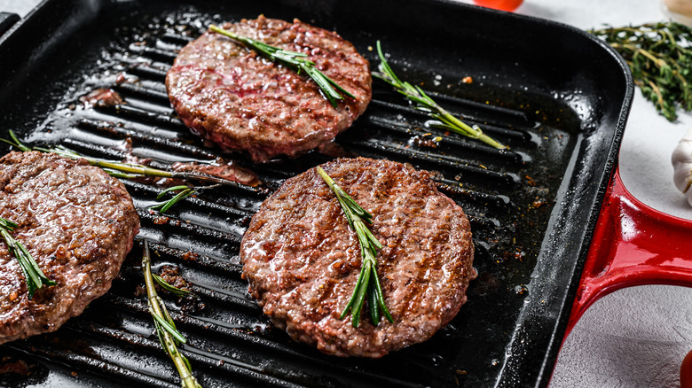 Burgers on grill