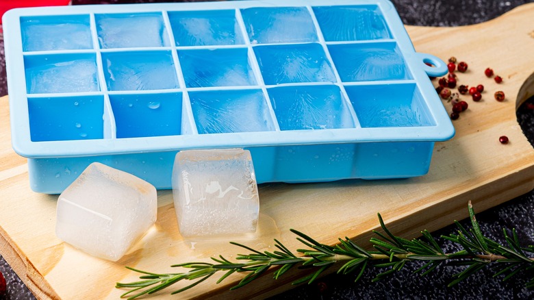 Ice cube tray on board