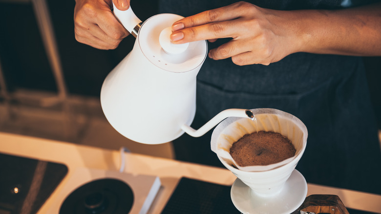 Pouring coffee into pour-over