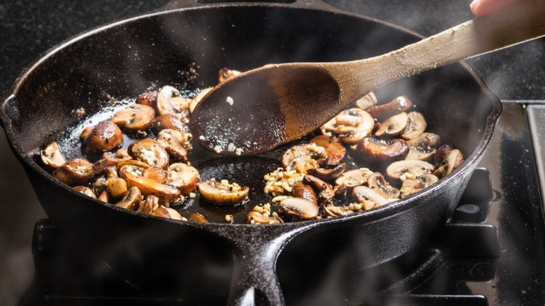 Sliced mushrooms in a skillet