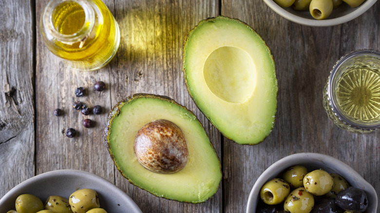 avocados and olives on table