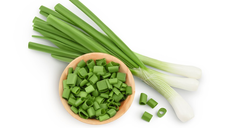 green onions on white background