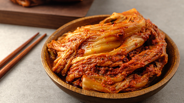 Kimchi in a wooden bowl