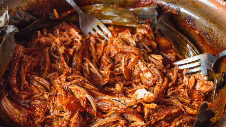 Saucy pulled pork and two forks