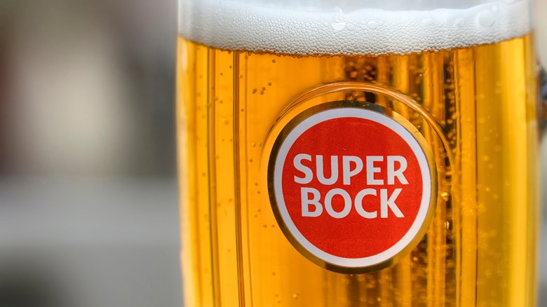 Super Bock beer logo on a glass