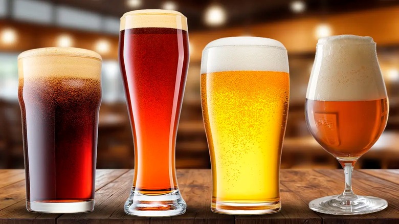 Four different glasses and types of beer