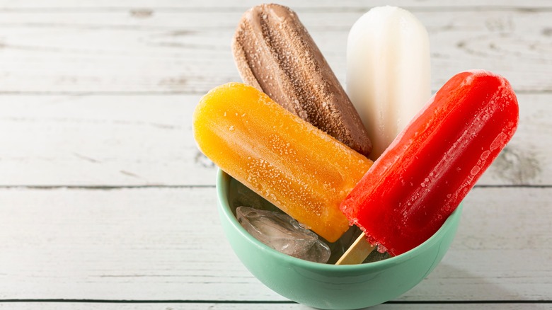 Colorful popsicles in a bowl