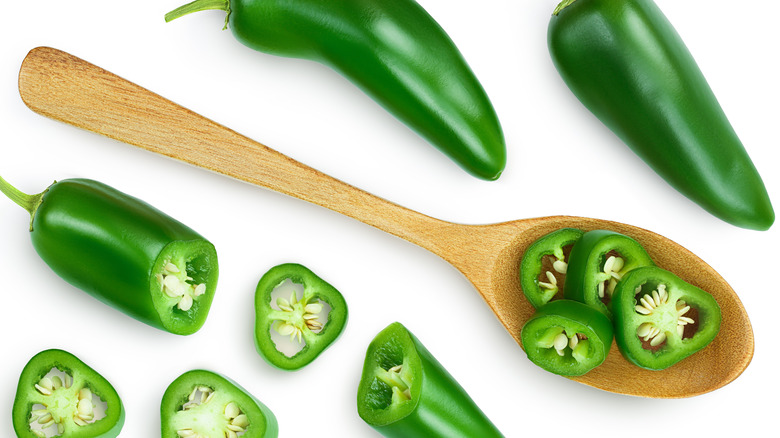 Jalapenos with wooden spoon