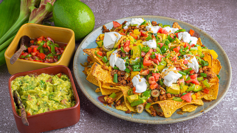 Nachos with guacamole and salsa