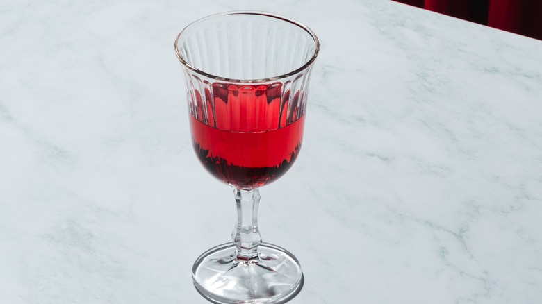glass of Lambrusco on countertop