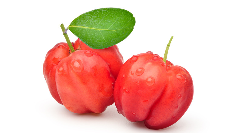 Acerola cherries on white background