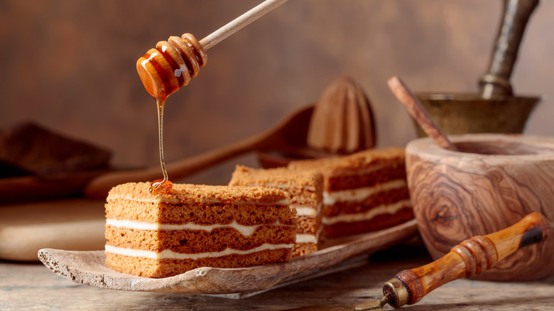 brown layered cake with honey