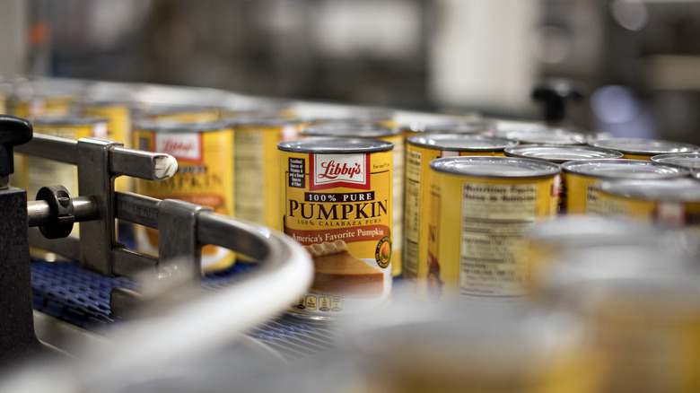 umpkin puree cans on conveyer