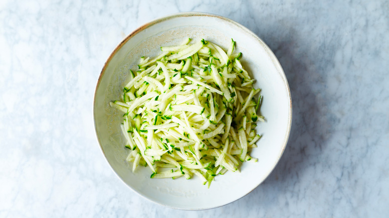 Ceramic bowl with grated zucchini