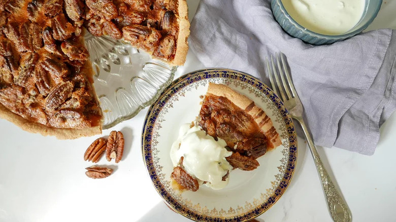Pecan pie on the table with a fork