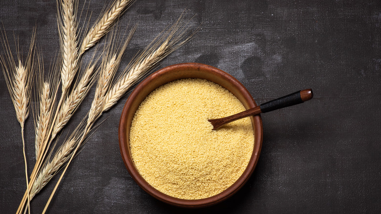 Couscous on slate background