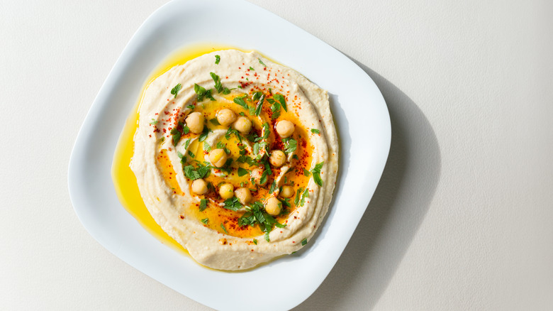 Hummus in white dish