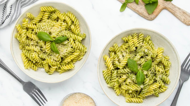 Bowls of pesto pasta 