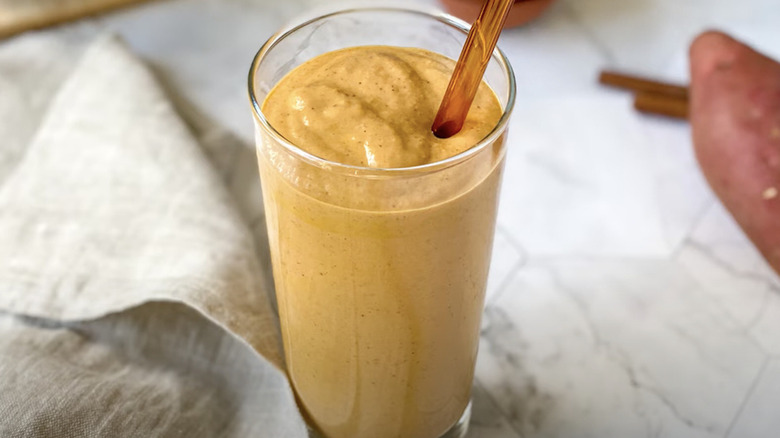 Sweet potato smoothie on table