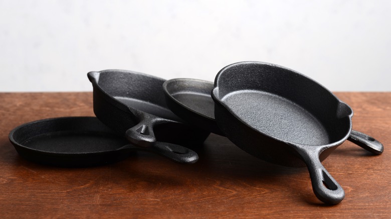 Cast iron pans on table