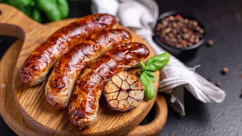 Vegan sausage on cutting board