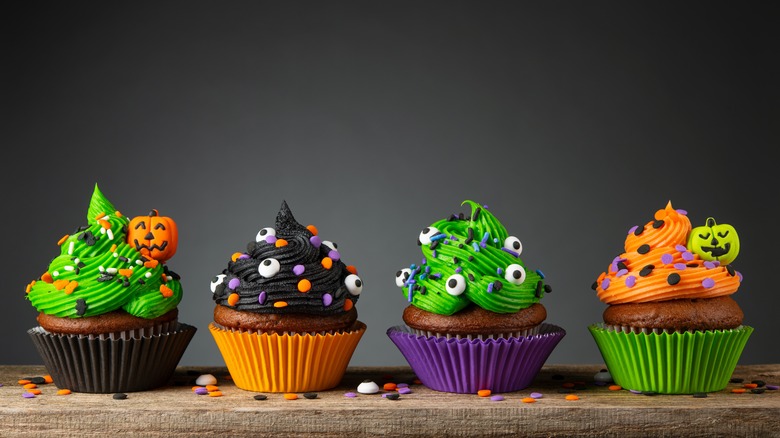 Halloween cupcakes on black background